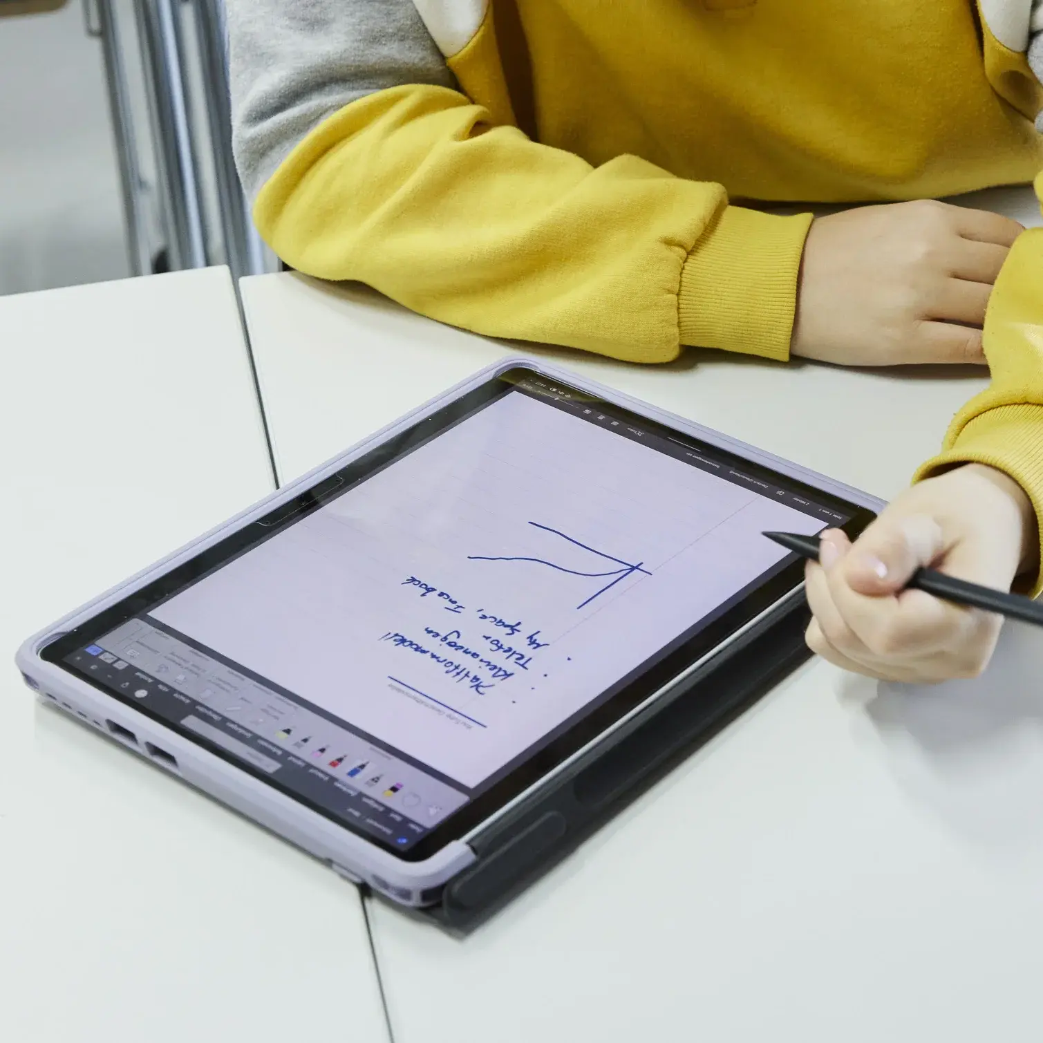 A student is working on a laptop.