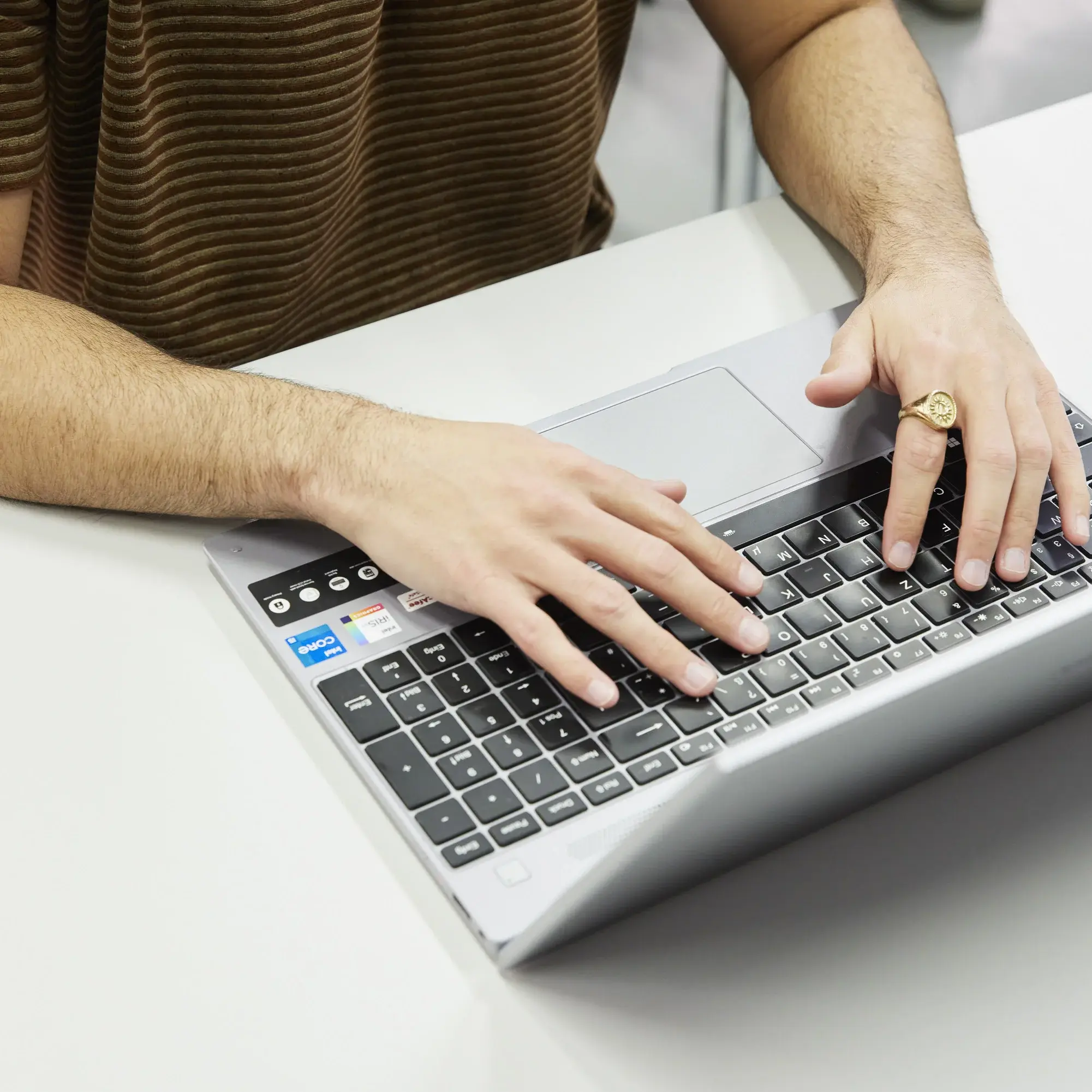 A student is working on a laptop.
