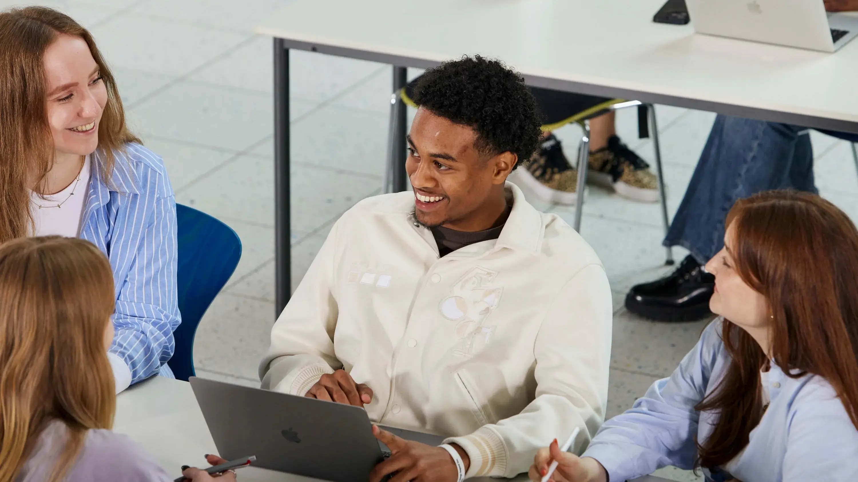 Students work together at the learning bar.