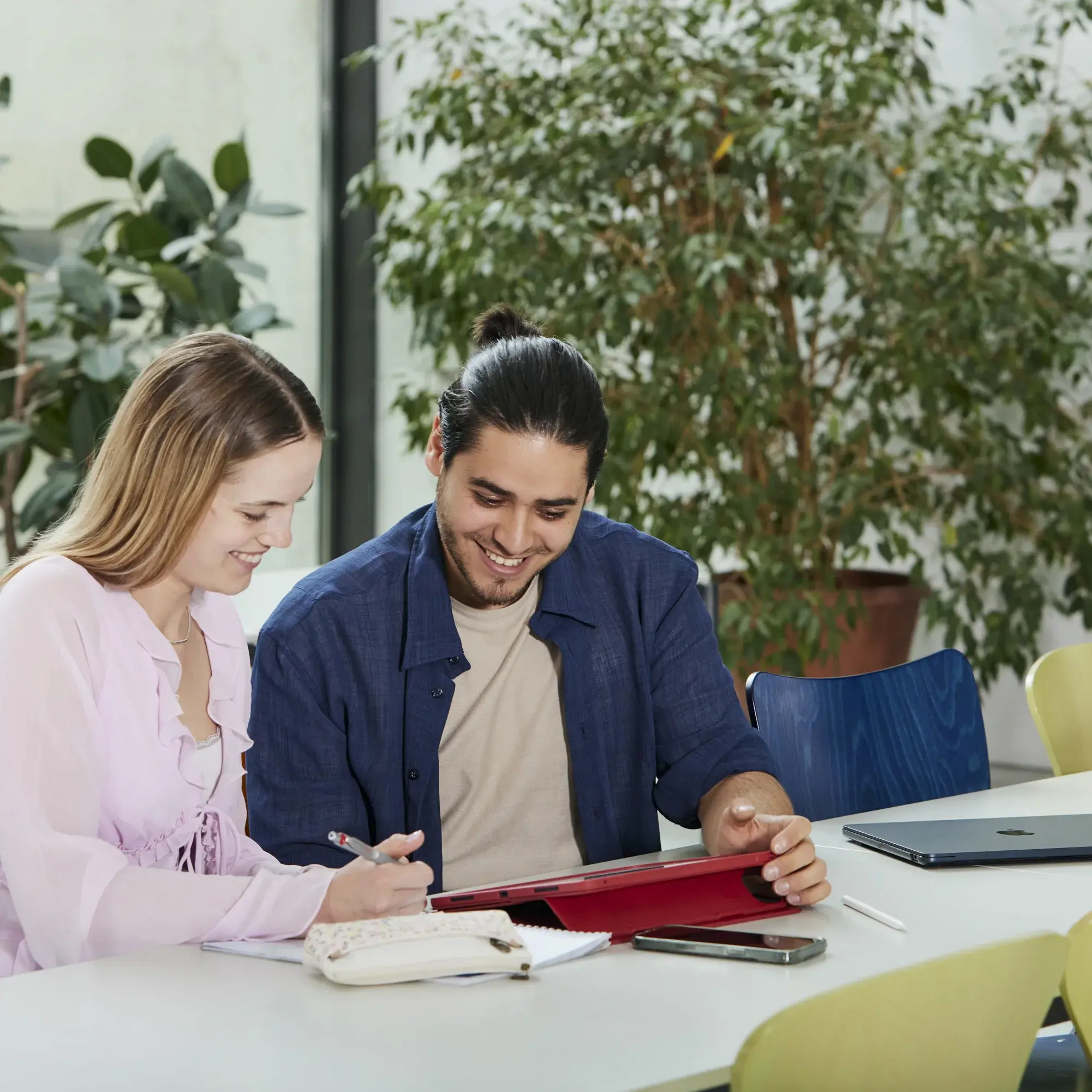 Students work together at the learning bar.