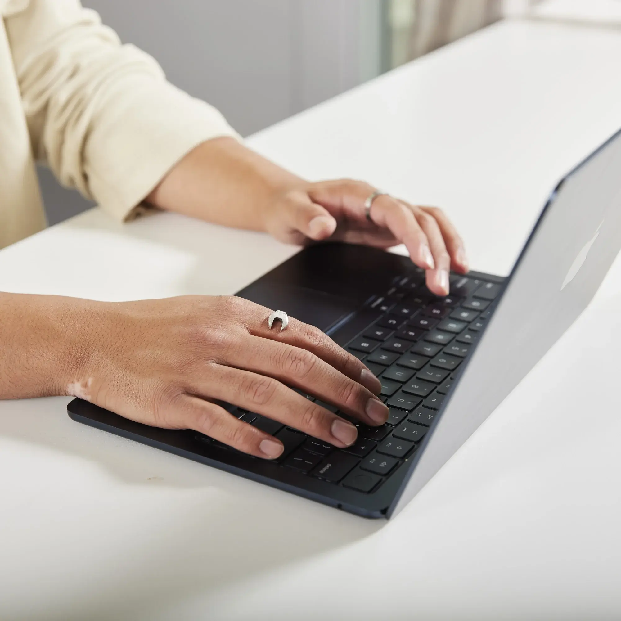A person working on a laptop.