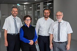 Das Dekanat der Fakultät Druck und Medien: Prof. Dr. Joachim Charzinski, Prof. Bettina Tabel, Prof. Dr. Michael Herrenbauer und Prof. Dr. Edmund Ihler (von links)